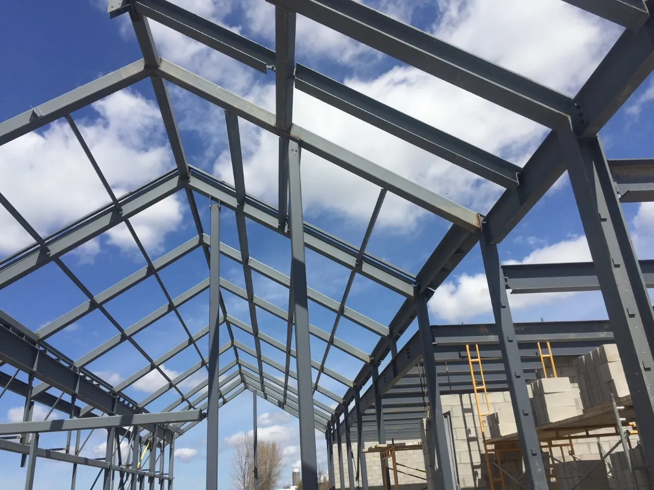 Structural steel framing erected on site.